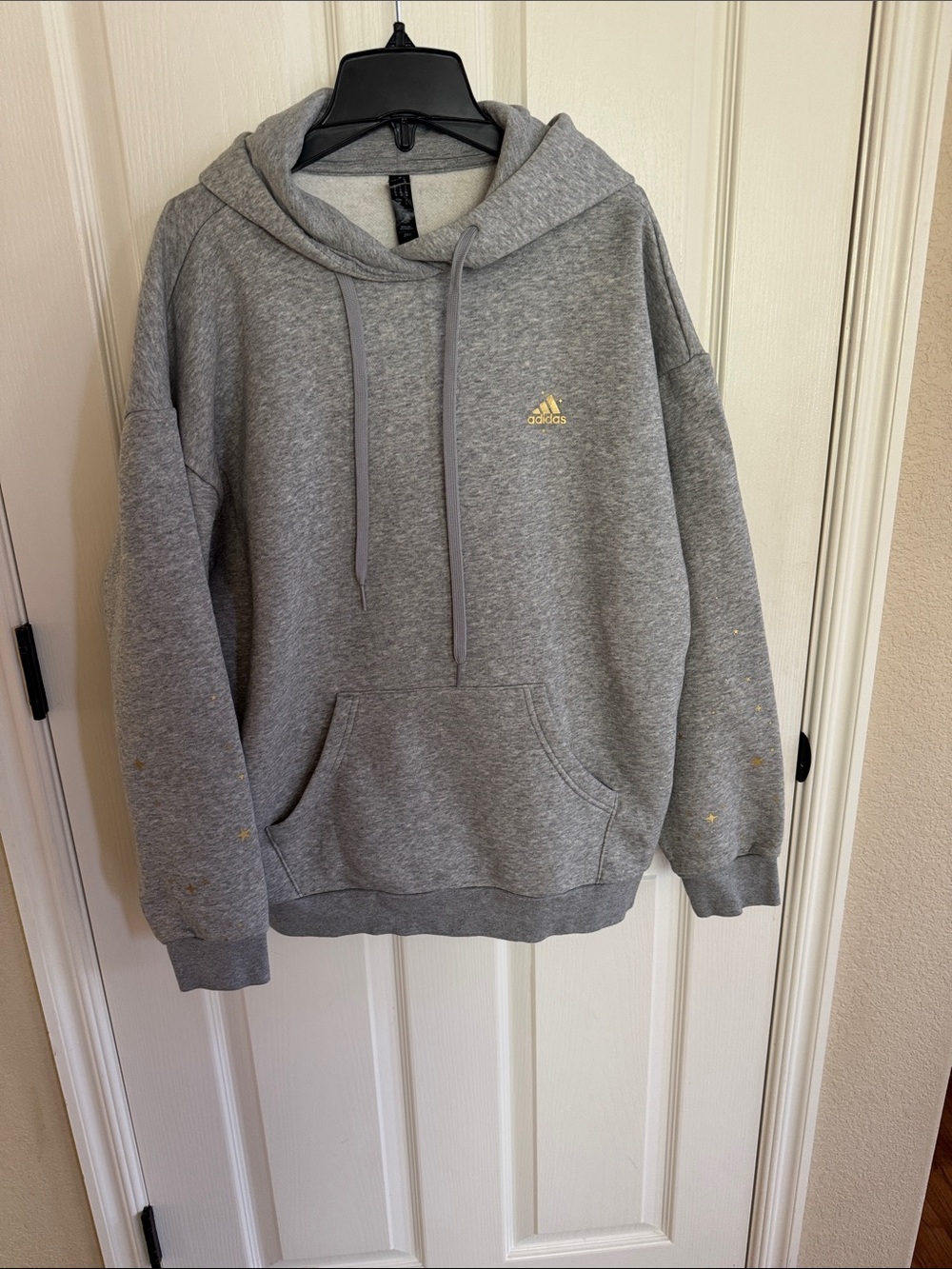 Adidas hoodie. Gold star accents with grey. Size small. Like new!